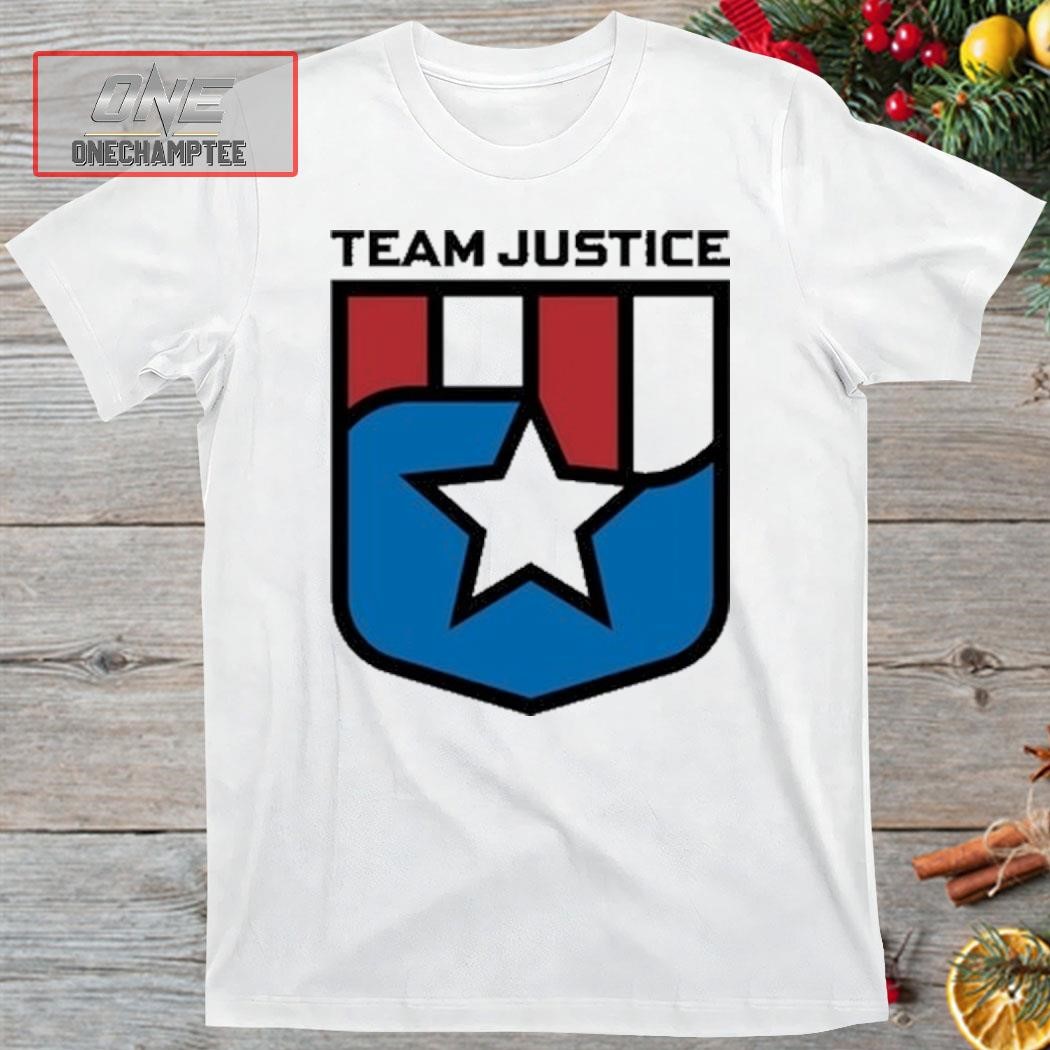 Cindy Perno Wearing Team Justice Shield Logo Shirt